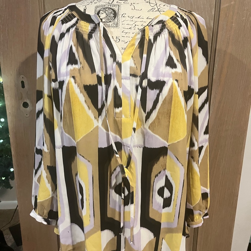 Women’s Charming Charlie’s tie neck blouse in XL